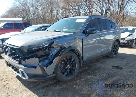 2023 Honda Cr-V Hybrid Sport Touring z USA, uszkodzony, nr VIN 2HKRS6H96PH811113